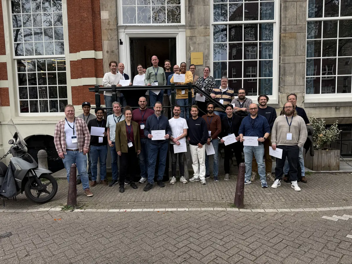 Participants of a previous Amsterdam edition with their certificates